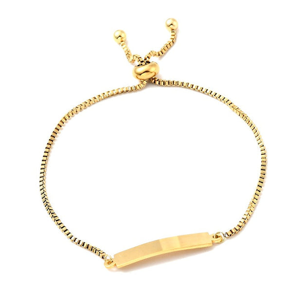 Gold-colored stainless steel curb chain bracelet with engraving plate